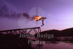© Jamie Budge, all rights reserved.
ANGIE WALTON FLYS OFF PIER INTO SCENIC PANORAMA WITH FLAMING WINDSKATE OVERHEAD.
NO RIGHTS Implied by Possession of this CD.   Contact:
jamiebudge@windskate.com   (310) 453-4808
