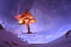 © Jamie Budge, All Rights Reserved.
JUSTIN KASE FLIPS HIS SAIL OVERHEAD FOR A FLAMING WINDSKI FLIGHT OVER CANYON TOWARDS LAKE.
NO RIGHTS Implied by posession of this CD.  Contact:
jamiebudge@windskate.com    (310) 453-4808