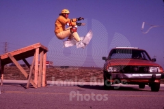 © Jamie Budge, All Rights Reserved.
AIRBORNE ON ICE BLOCK SKATES, CHUCK WARD RELEASES TOW ROPE AND SOARS TOWARDS CAR.
NO RIGHTS Implied by posession of this CD.  Contact:
jamiebudge@windskate.com    (310) 453-4808