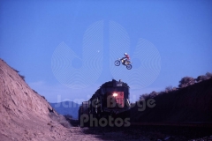 © Jamie Budge, all rights reserved.
UNIDENTIFIED FLYING MOTORCYCLIST DIRECTLY OVER TRAIN MOVING THROUGH EL CAJON SUMMIT, CA.
No Rights Implied by possession of this image.     Contact:
Jamie Budge (310) 453-4808  jamiebudge@windskate.com