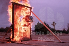 © Jamie Budge, all rights reserved.
CHUCK WARD SHATTERS WALL OF BURNING GLASS WITH FISTS AND HELMET AS HE CRASHES THRU.
NO RIGHTS Implied by Possession of this CD.   Contact:
jamiebudge@windskate.com   (310) 453-4808