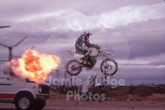 © Jamie Budge, all rights reserved.
MOTORCYCLE STUNTMAN JUSTIN KASE TRAILS FLAMES AFTER BREAKING THRU WINDSHIELD OF MOVING VAN.
No Rights Implied by possession of this image.     Contact:
Jamie Budge (310) 453-4808  jamiebudge@windskate.com