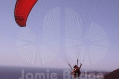 © Jamie Budge, all rights reserved.
NATHAN CARERAS SOARS HIS PARAGLIDER ABOVE LATIGO POINT IN MALIBU, CALIFORNIA.
No Rights Implied by possession of this image.     Contact:
Jamie Budge (310) 453-4808  jamiebudge@windskate.com