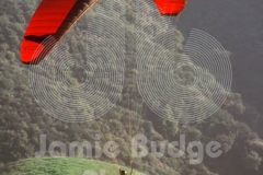 © Jamie Budge, all rights reserved.
RED CHUTE GLIDES ABOVE GREEN FIELDS AT CALABASAS, CA.
No Rights Implied by possession of this image.     Contact:
Jamie Budge (310) 453-4808  jamiebudge@windskate.com
