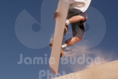 SANDBOARDER CATCHES AIR © Jamie Budge, All Rights Reserved.
TYLER KENT CATCHES SOME SANDBOARDING AIR AT DUMONT DUNES, CA