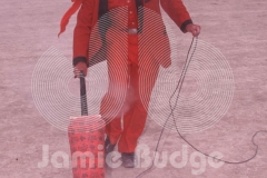 © Jamie Budge, All Rights Reserved.
"DIRT DEVIL" HAD A LONG EXTENSION CORD AND WAS FULL OF JUICE AS HE VACUUMED BLACK ROCK DESERT.
NO RIGHTS Implied by posession of this CD.  Contact:
jamiebudge@windskate.com    (310) 453-4808