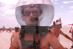 © Jamie Budge, All Rights Reserved.
"BUBS" (HE CALLS HIMSELF) FROM SAN FRANCISCO, PREFERS TO BEAT THE HEAT WITH HIS "HEAD IN A  FISHBOWL."
NO RIGHTS Implied by posession of this CD.  Contact:
jamiebudge@windskate.com    (310) 453-4808