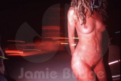 © Jamie Budge, All Rights Reserved.
GIRL DANCES NAKED AGAINST BACKGROUND OF FADING  BURNING MAN EMBERS.
NO RIGHTS Implied by posession of this CD.  Contact:
jamiebudge@windskate.com    (310) 453-4808